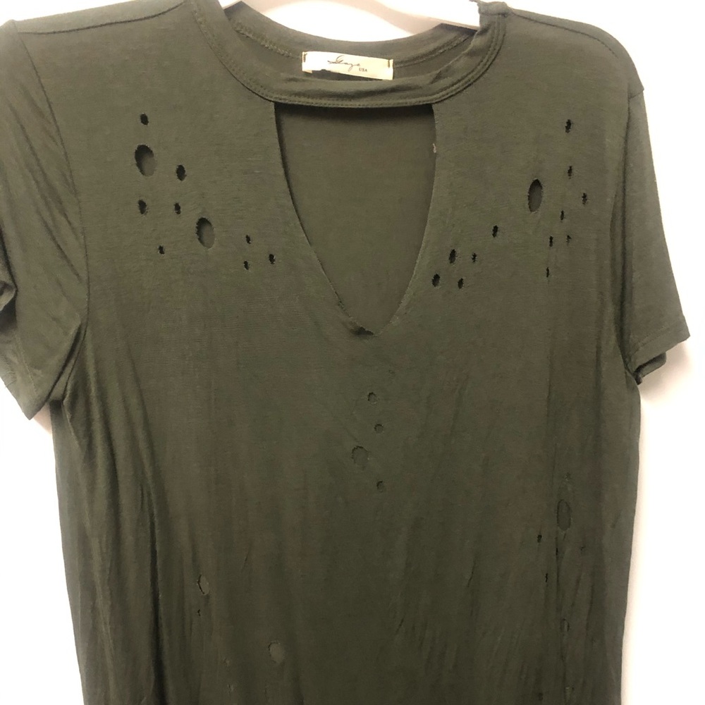 Shirt with cutouts